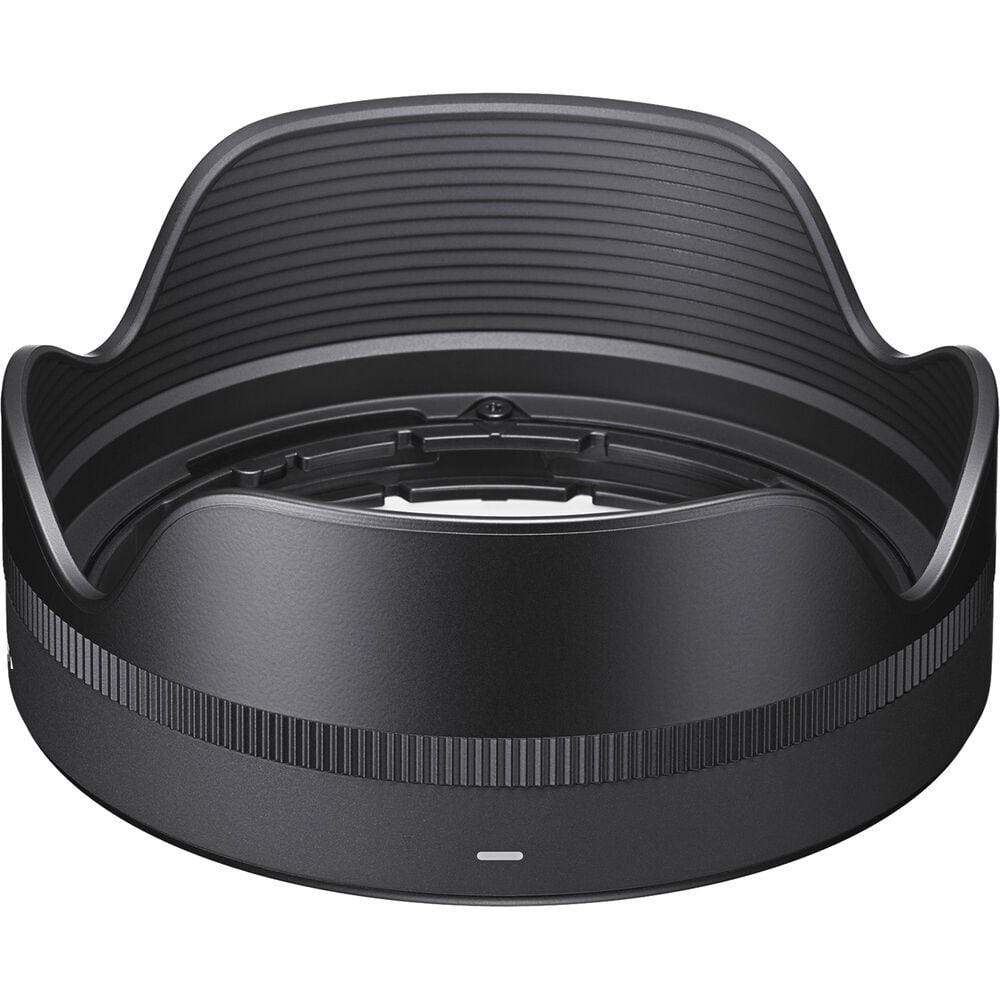 Black camera lens hood on a white background
