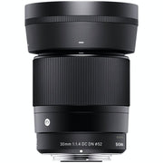 Sigma camera lens on a white background