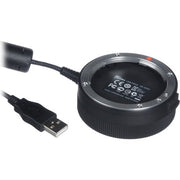Circular USB device with a cable on a white background