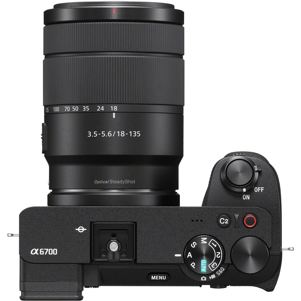 Black camera with lens and control buttons on a white background