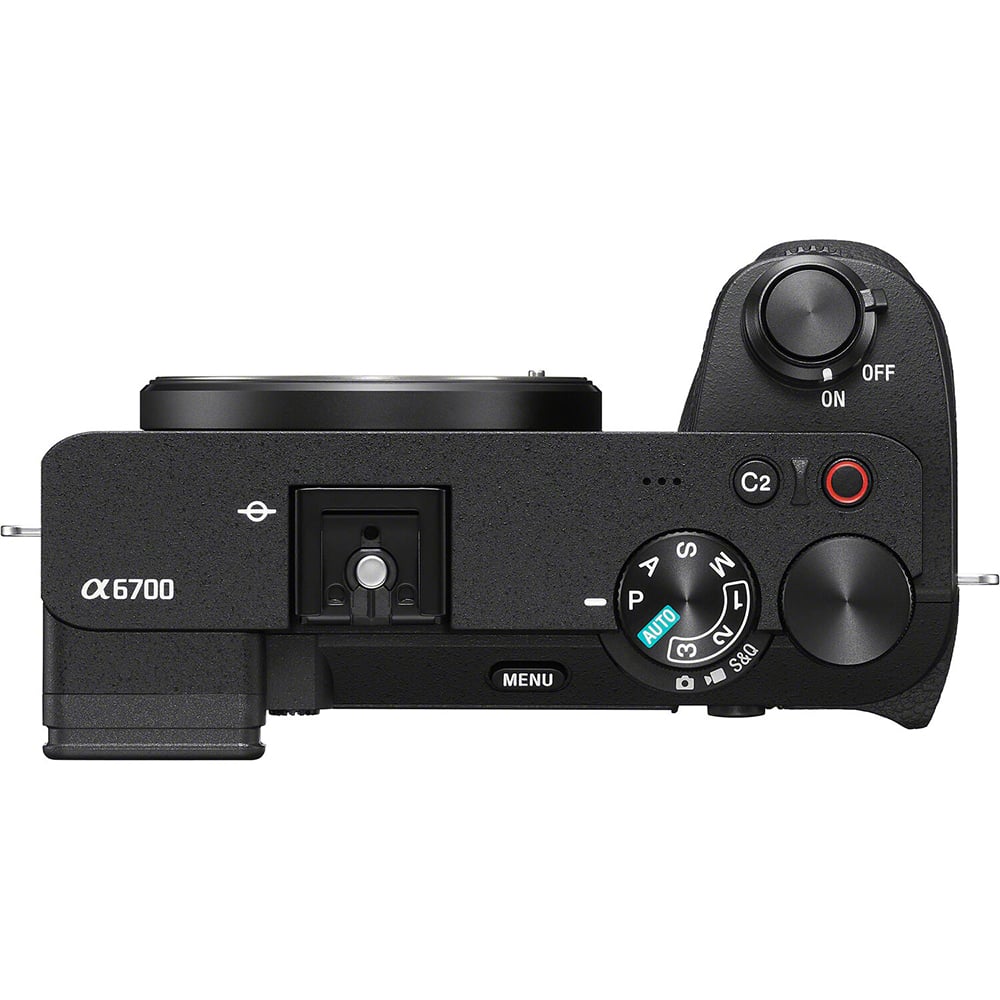 Black camera body with control dials and buttons on a white background