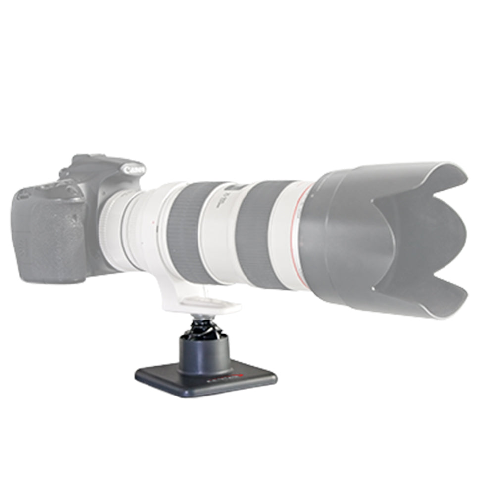 StediLens Base Unit for camera and telephoto lens stabilisation, with broad non‑slip silicone pads, compact cylindrical body and central screwball attachment point, designed for stable, gimbal‑like movement on beanbags, tripods or flat surfaces.