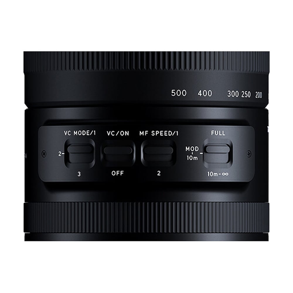 Black camera lens with control buttons on a white background