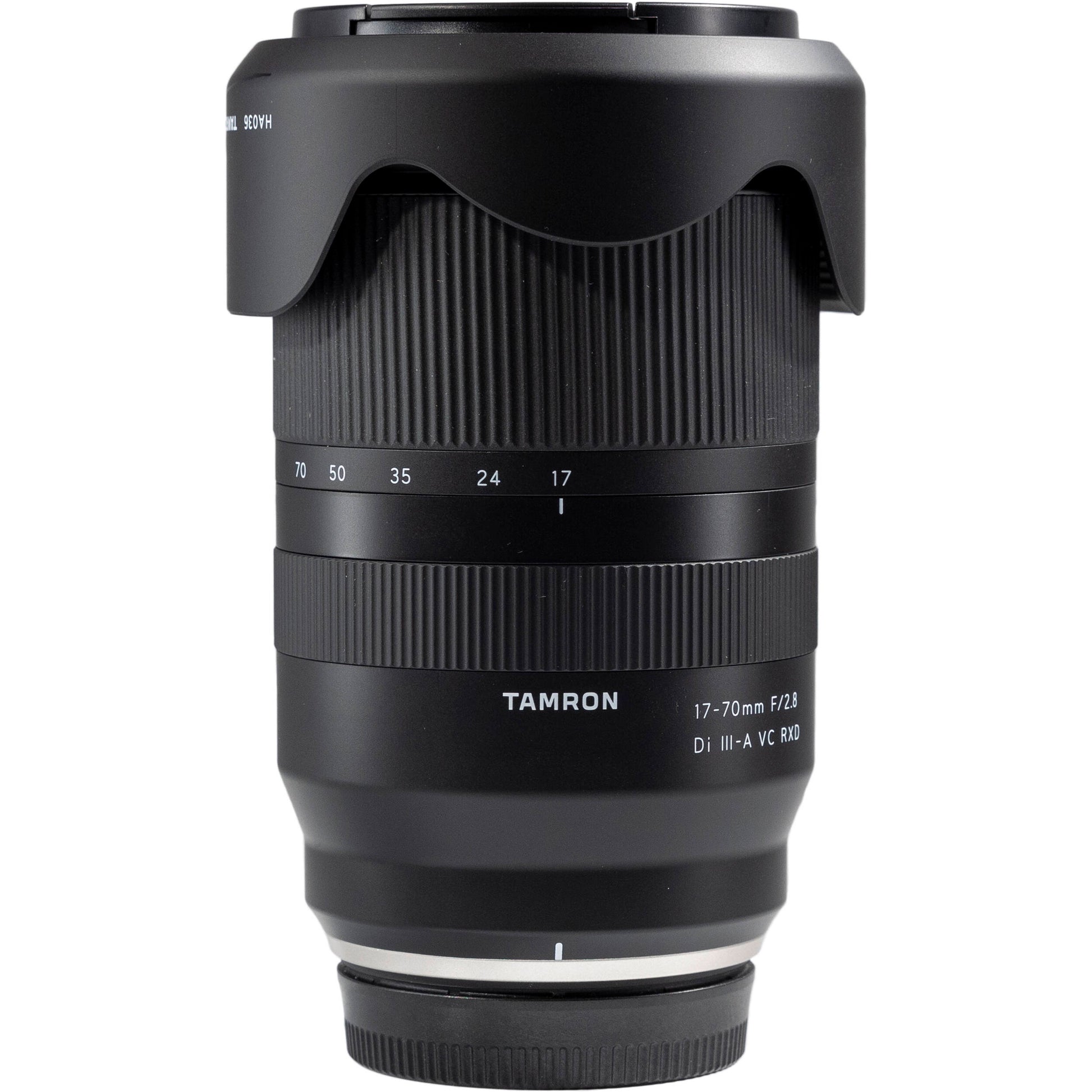 Black Tamron camera lens on a white background