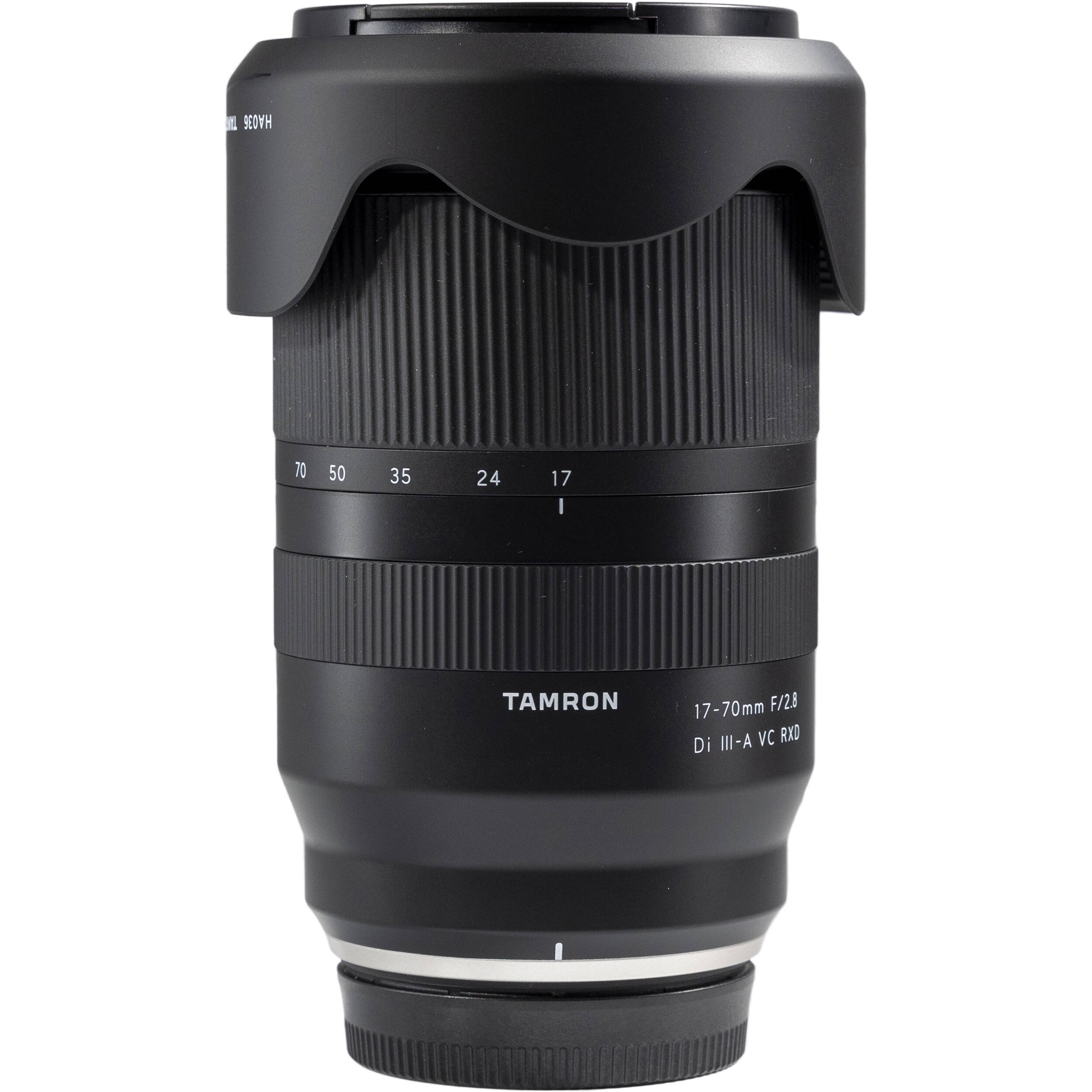 Black Tamron camera lens on a white background