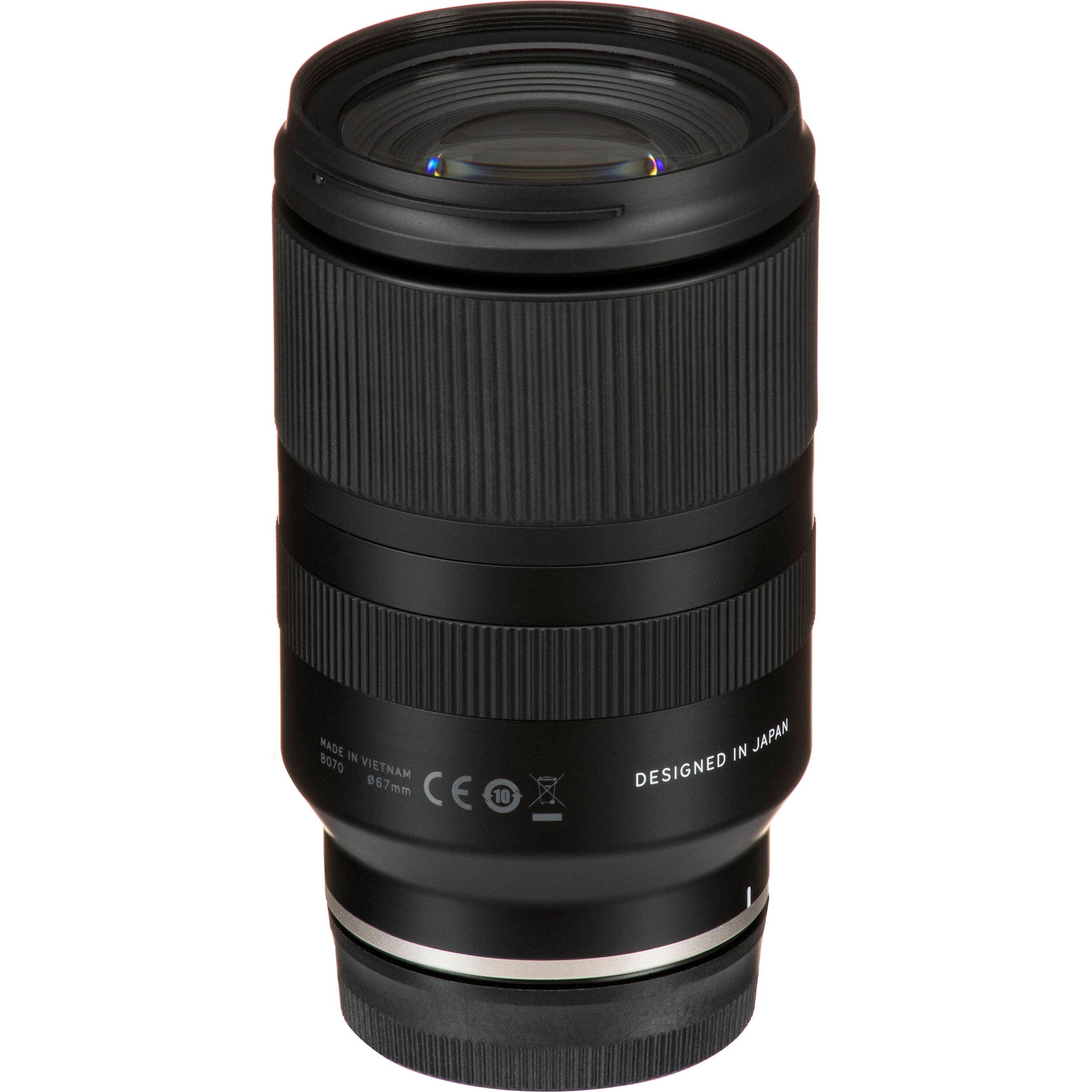 Camera lens with 'Designed in Japan' text on a white background