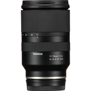 Black Tamron camera lens on a white background