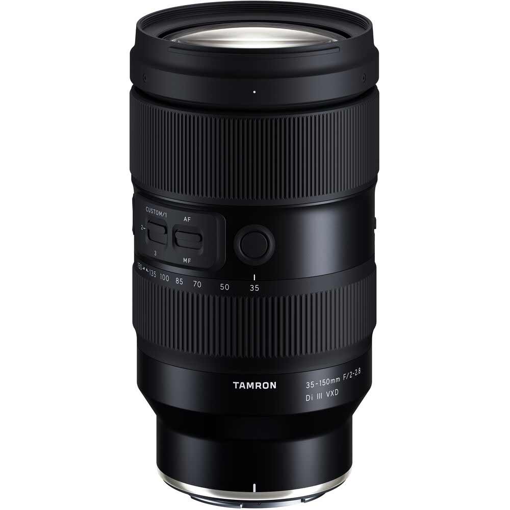 Black camera lens with Tamron branding on a white background