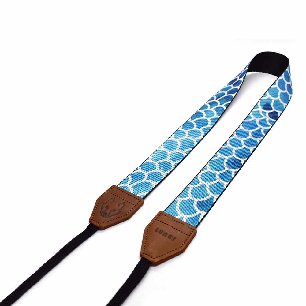 Inspired by  South Africa's majestic coastline, the Lunar Coastal camera strap is perfect for beachgoers, surfers and anyone who loves the big blue ocean.