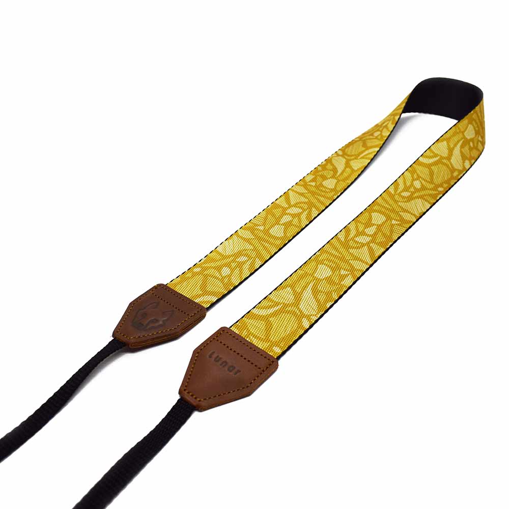 The Lunar Dijon camera is right on trend with its summary mustard colour. Handmade in South Africa. Features genuine leather ends. Shop at Outdoorphoto.