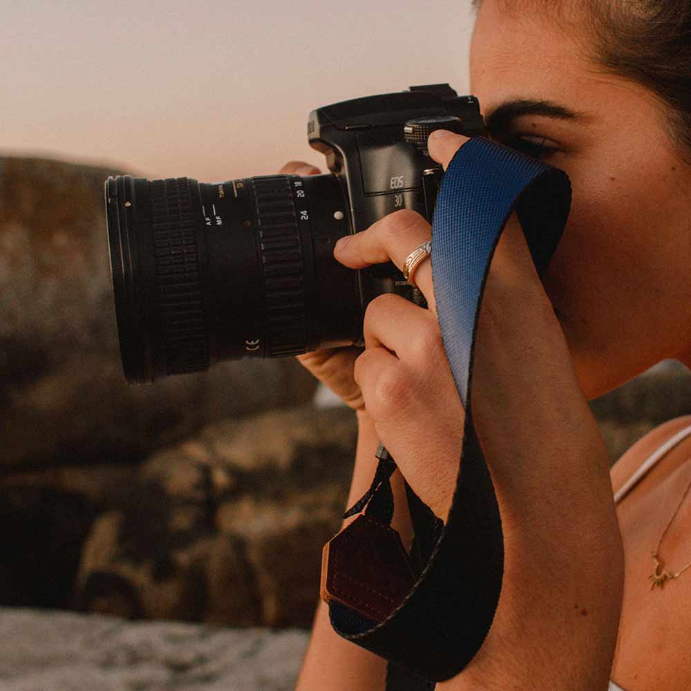 Inspired by the big open skies of Africa, the Lunar Explorer camera strap is perfect for adventurers at heart. Features genuine leather ends. For sale online.