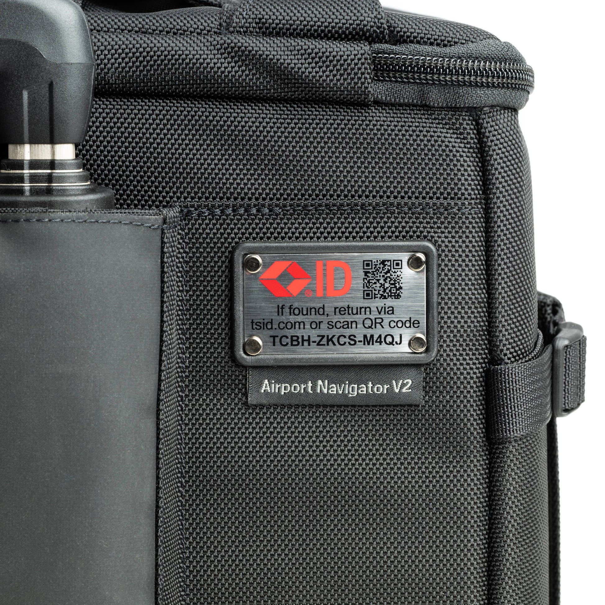 Think Tank Airport Navigator V2 rolling camera bag with laptop compartment and adjustable dividers.