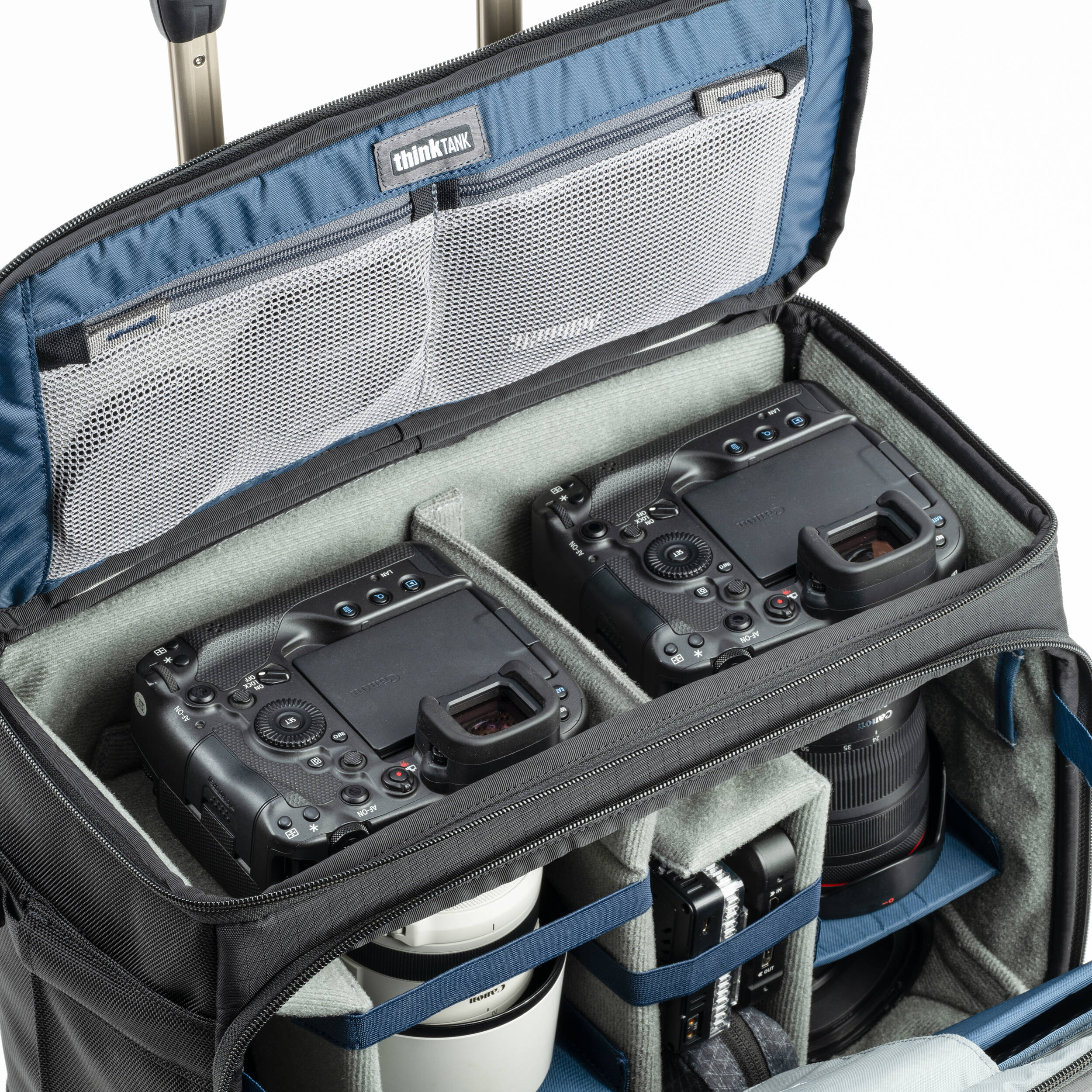 Think Tank Airport Navigator V2 rolling camera bag with laptop compartment and adjustable dividers.