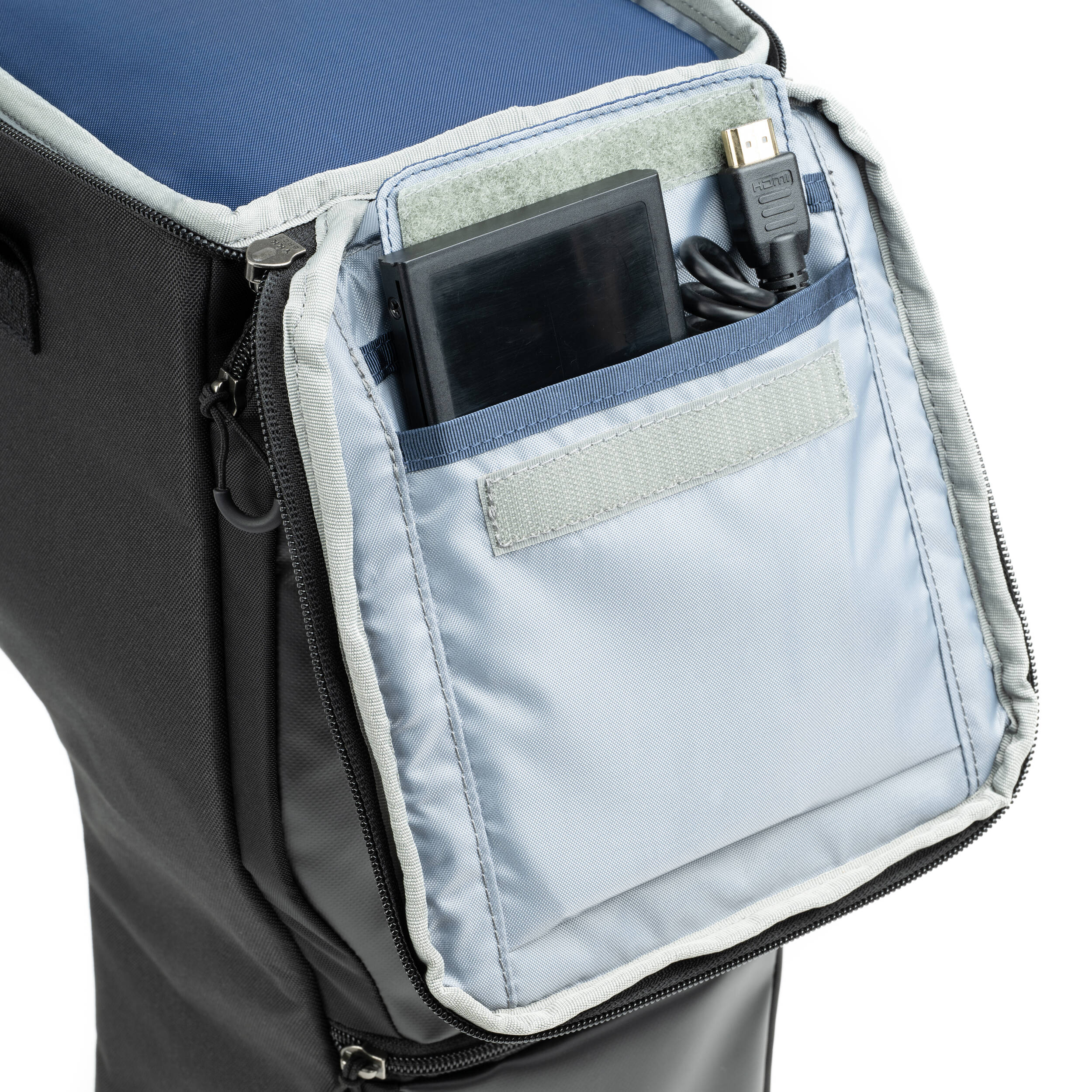 Think Tank Digital Holster 150 for 150–600mm lenses with belt/shoulder carry and accessory pockets.