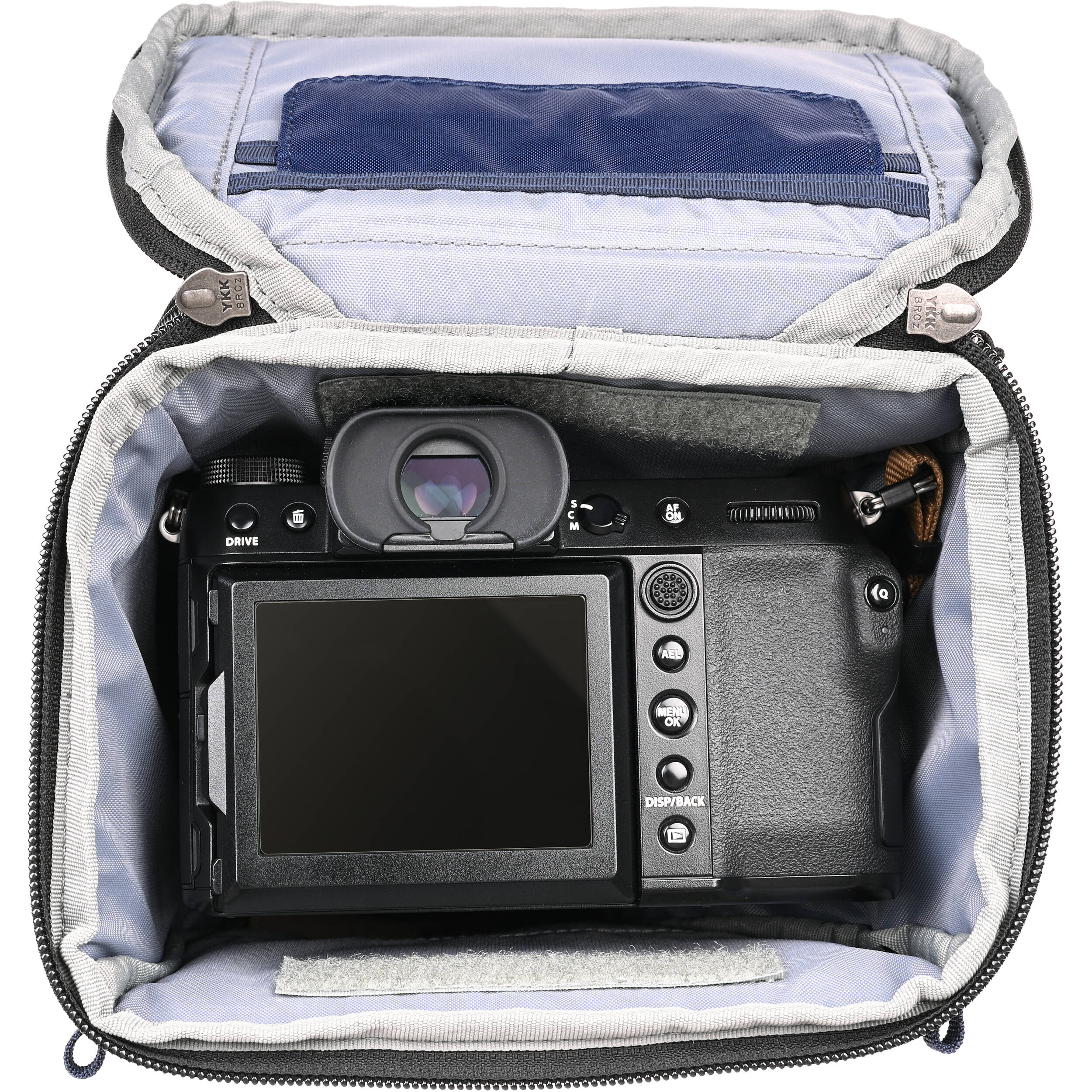 Think Tank Digital Holster 20 V3 for mirrorless cameras, quick-access, water-resistant, with shoulder strap.