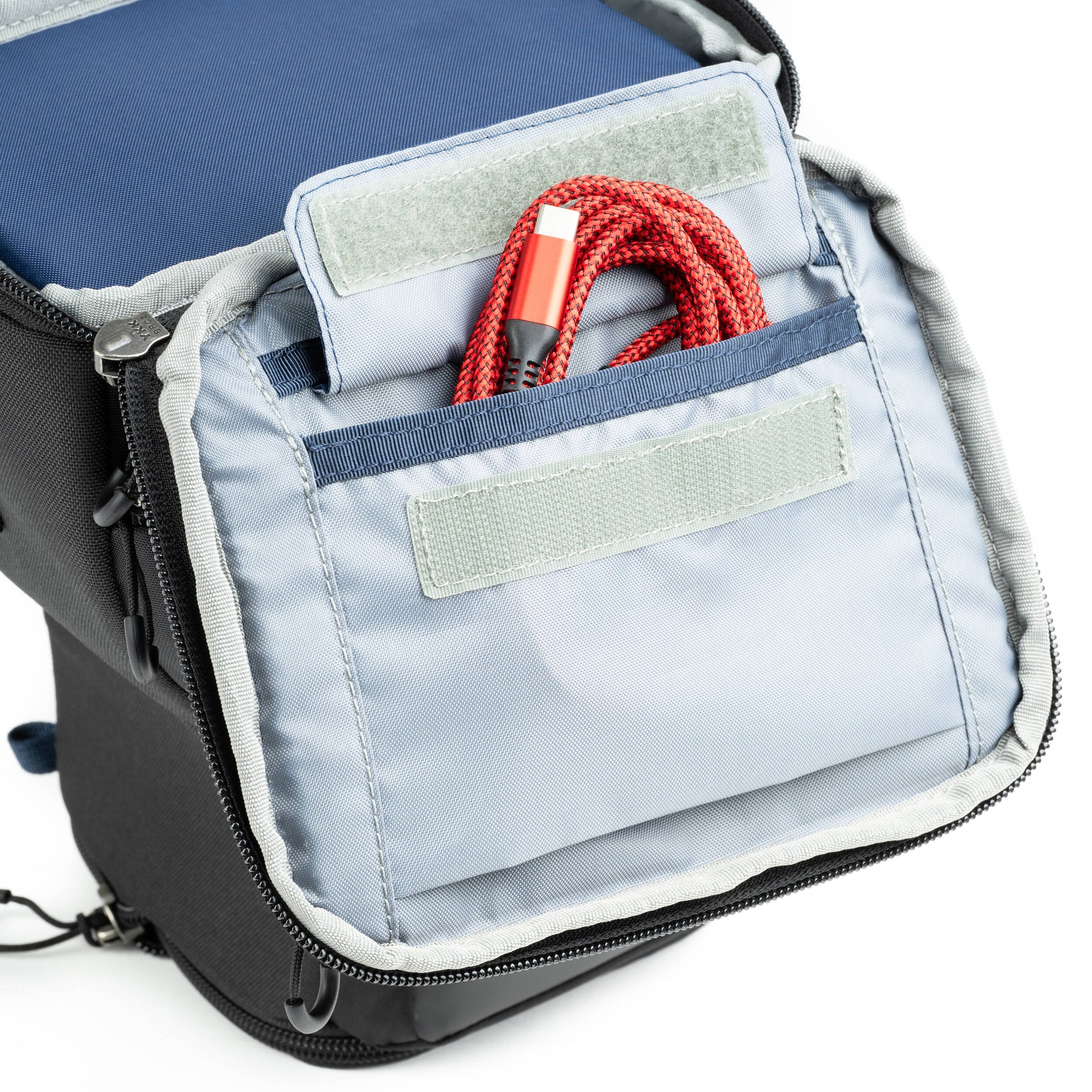 Think Tank Digital Holster 20 V3 for mirrorless cameras, quick-access, water-resistant, with shoulder strap.
