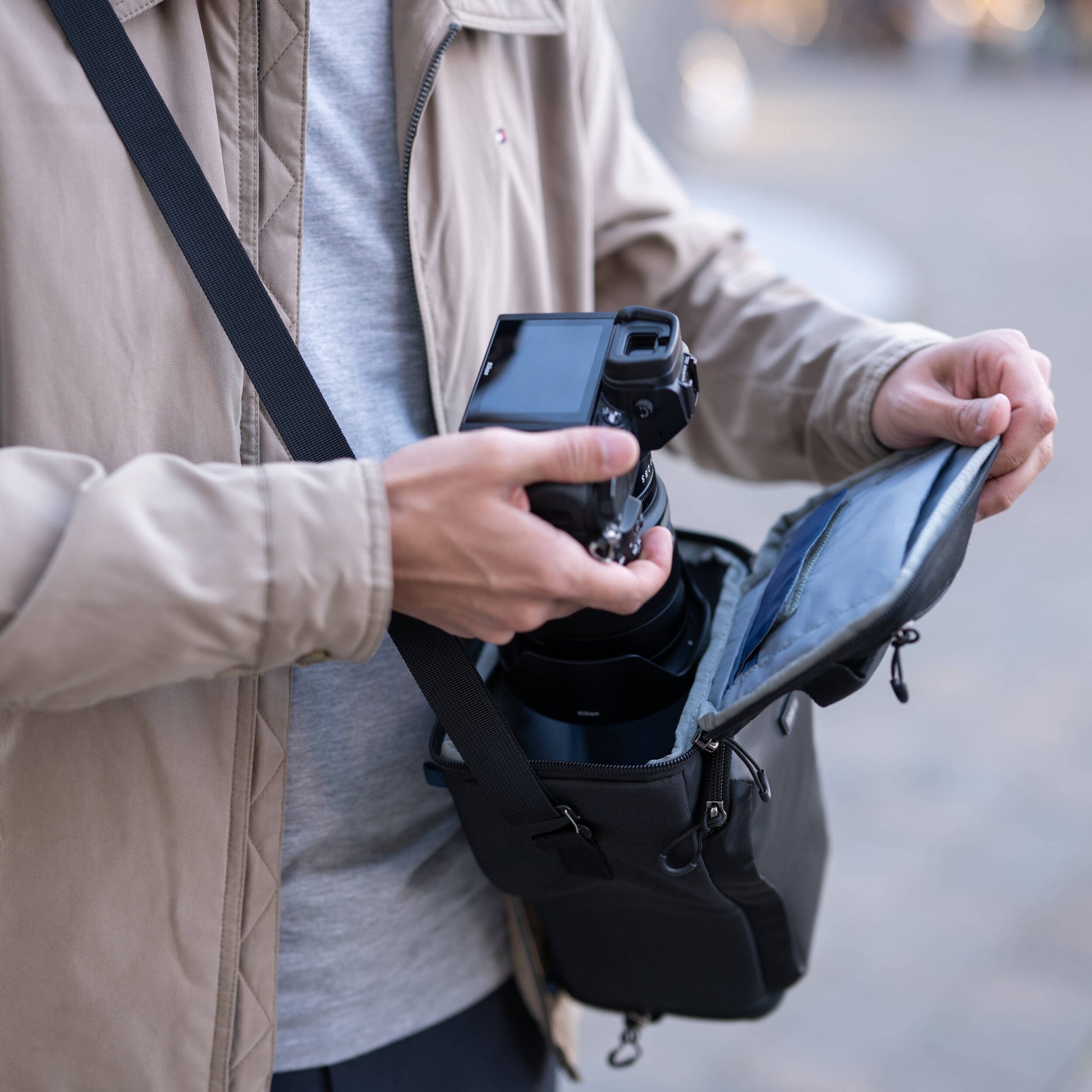 Think Tank Digital Holster 20 V3 for mirrorless cameras, quick-access, water-resistant, with shoulder strap.