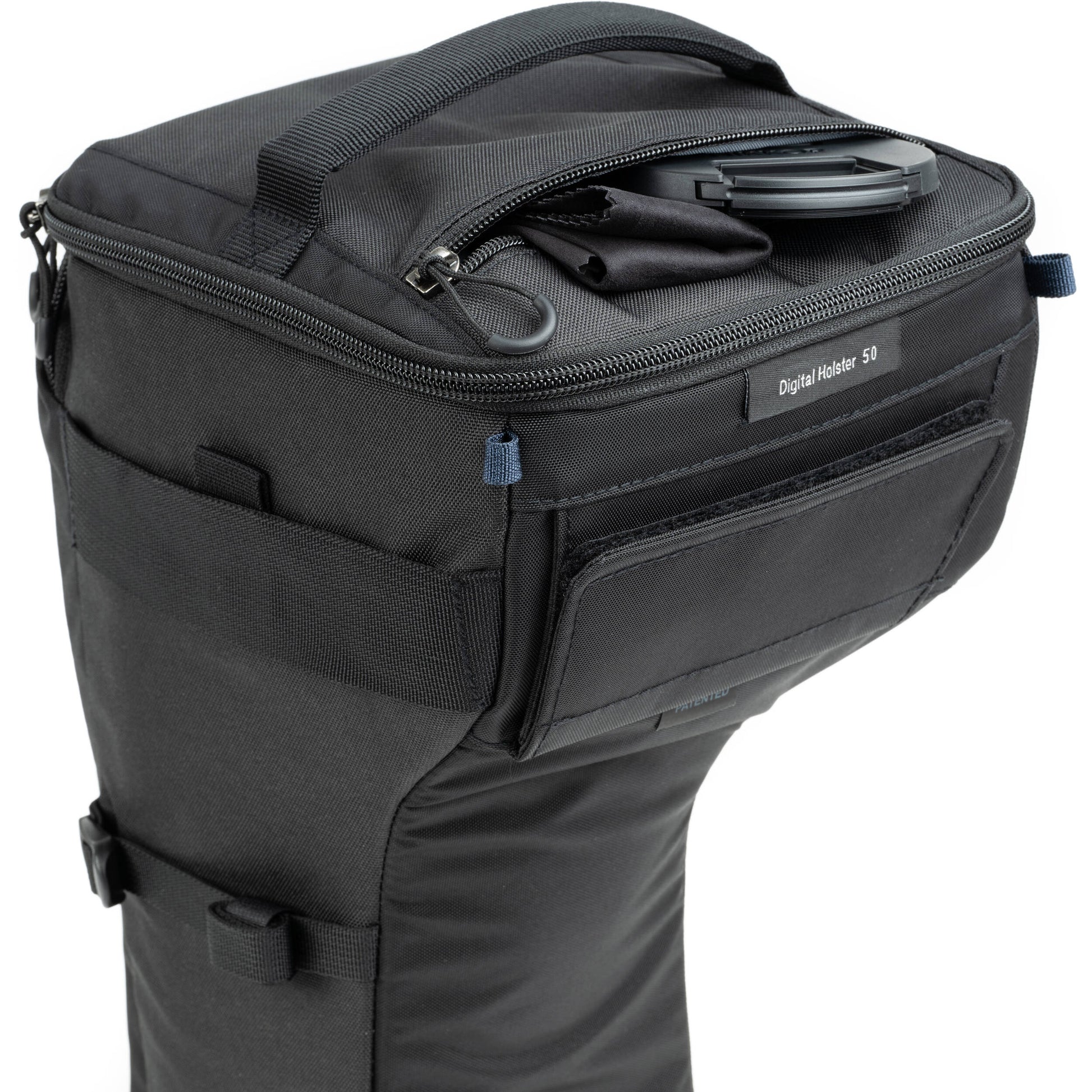 Think Tank Digital Holster 50 V3 bag for DSLR with 70-200mm lens, quick-access lid, belt attachment, and water-resistant design.
