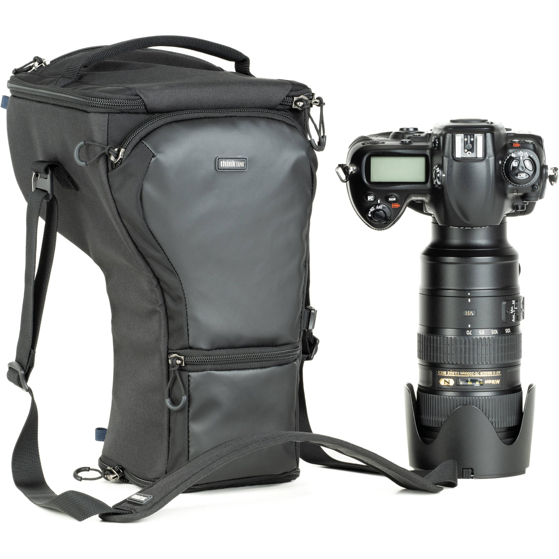 Think Tank Digital Holster 50 V3 bag for DSLR with 70-200mm lens, quick-access lid, belt attachment, and water-resistant design.