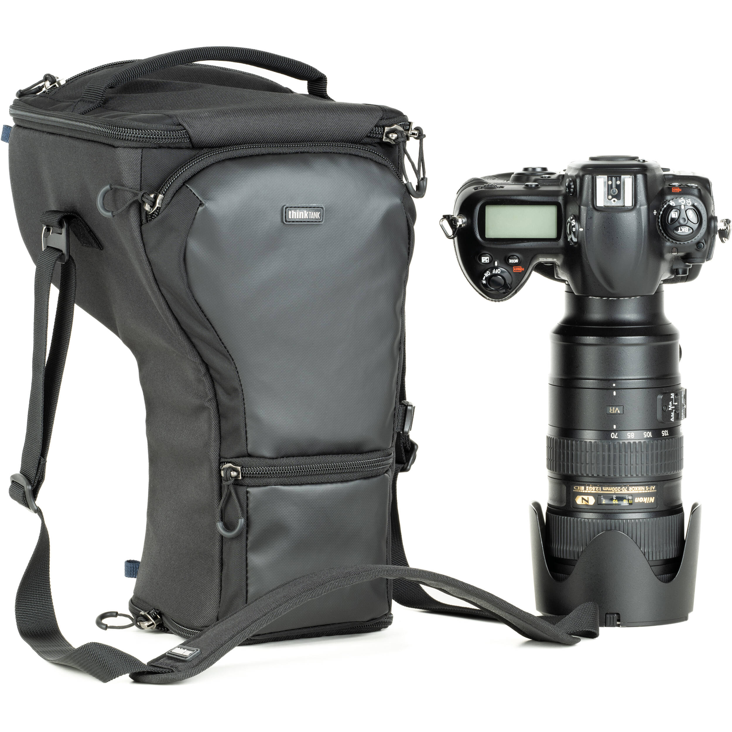 Think Tank Digital Holster 50 V3 bag for DSLR with 70-200mm lens, quick-access lid, belt attachment, and water-resistant design.