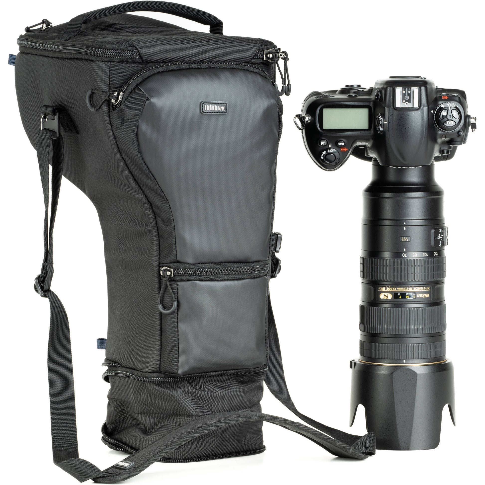 Think Tank Digital Holster 50 V3 bag for DSLR with 70-200mm lens, quick-access lid, belt attachment, and water-resistant design.
