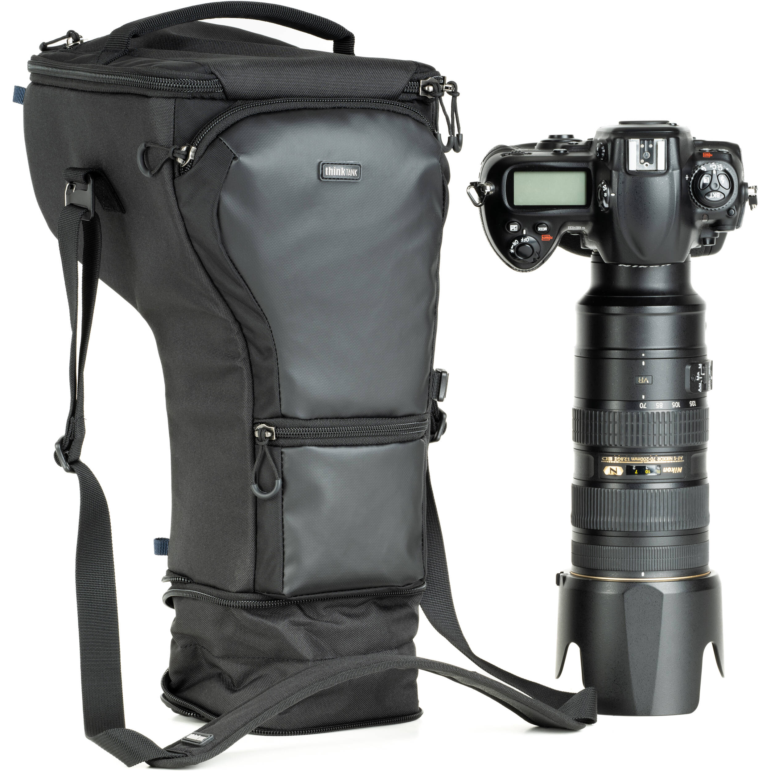 Think Tank Digital Holster 50 V3 bag for DSLR with 70-200mm lens, quick-access lid, belt attachment, and water-resistant design.

