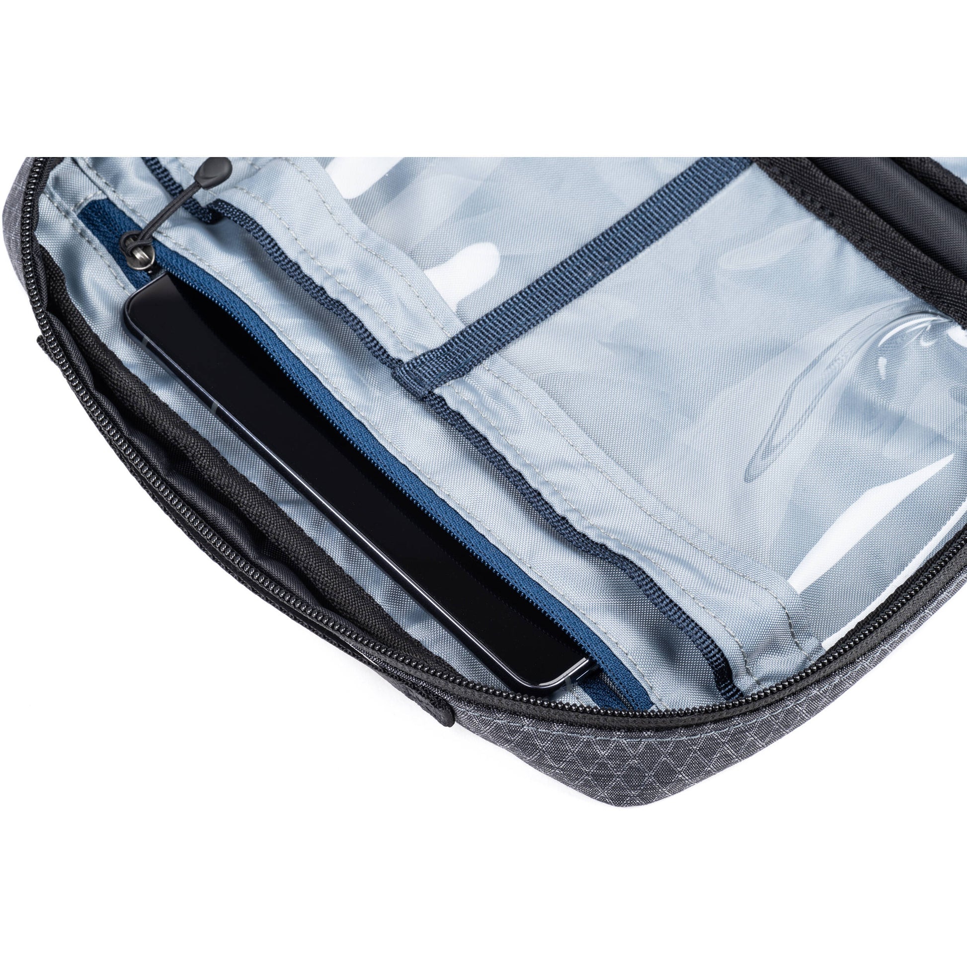 Think Tank EDC Pouch with pockets, zippered compartment, water-repellent coating, and open-flat design for easy access.
