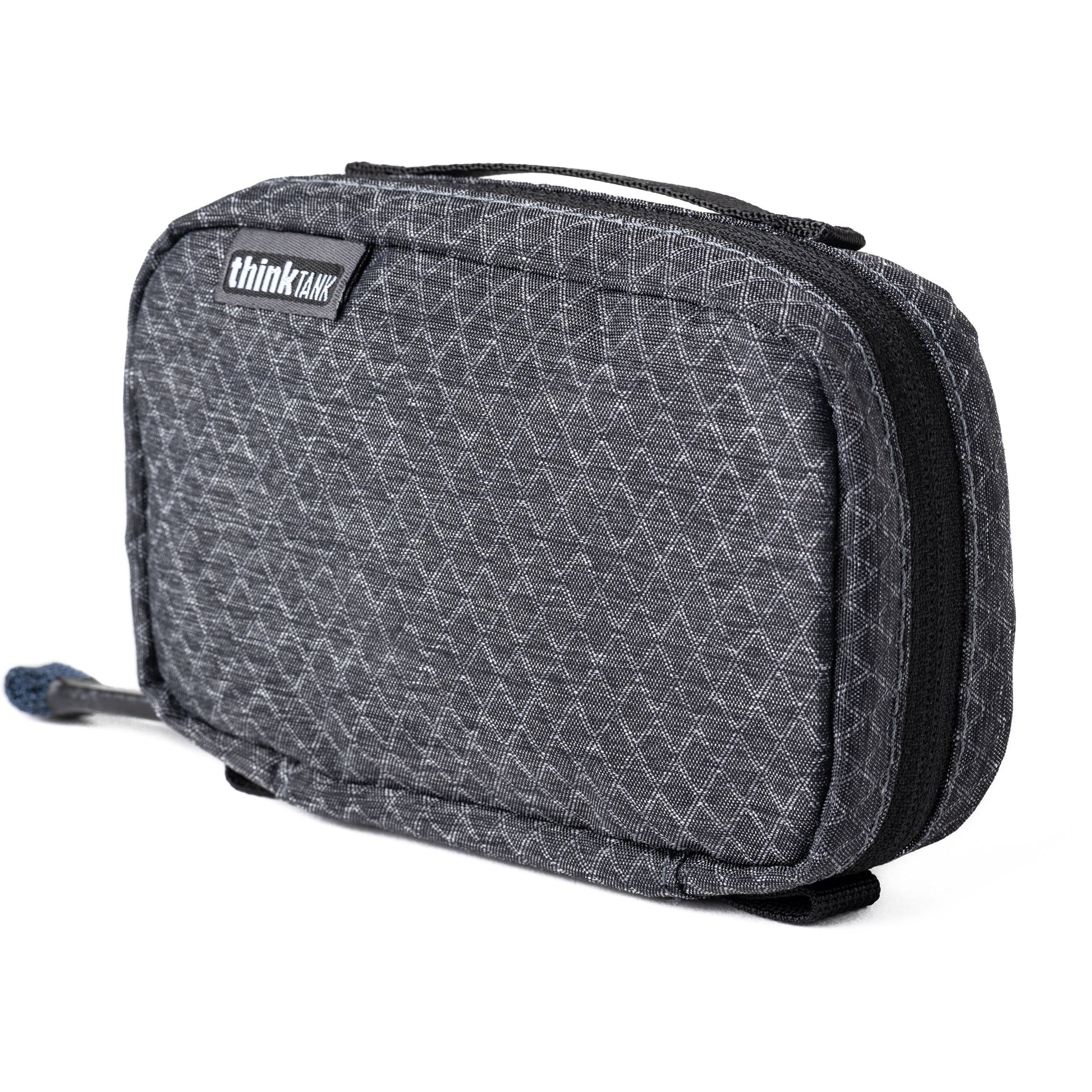 Think Tank EDC Pouch with pockets, zippered compartment, water-repellent coating, and open-flat design for easy access.