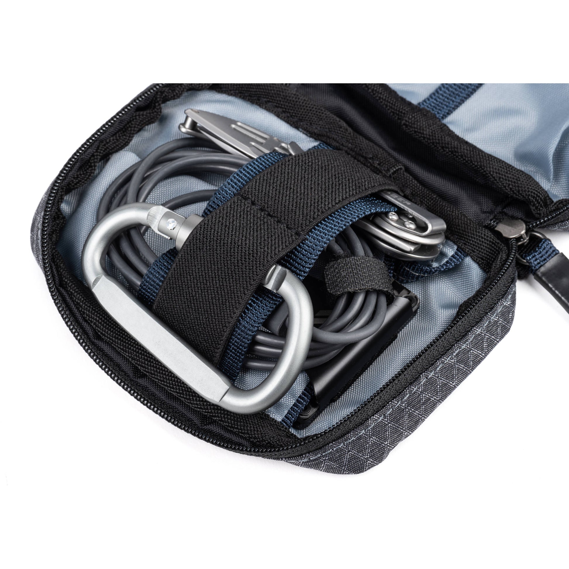 Think Tank EDC Pouch with pockets, zippered compartment, water-repellent coating, and open-flat design for easy access.