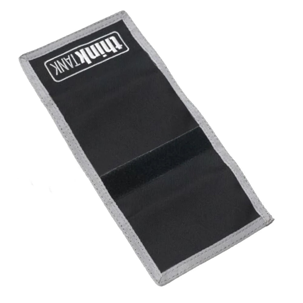 Think Tank Memory Card Wallet CF6 (Black) holds up to 6 CF cards, made of water-resistant nylon with clear pockets and secure velcro closure.