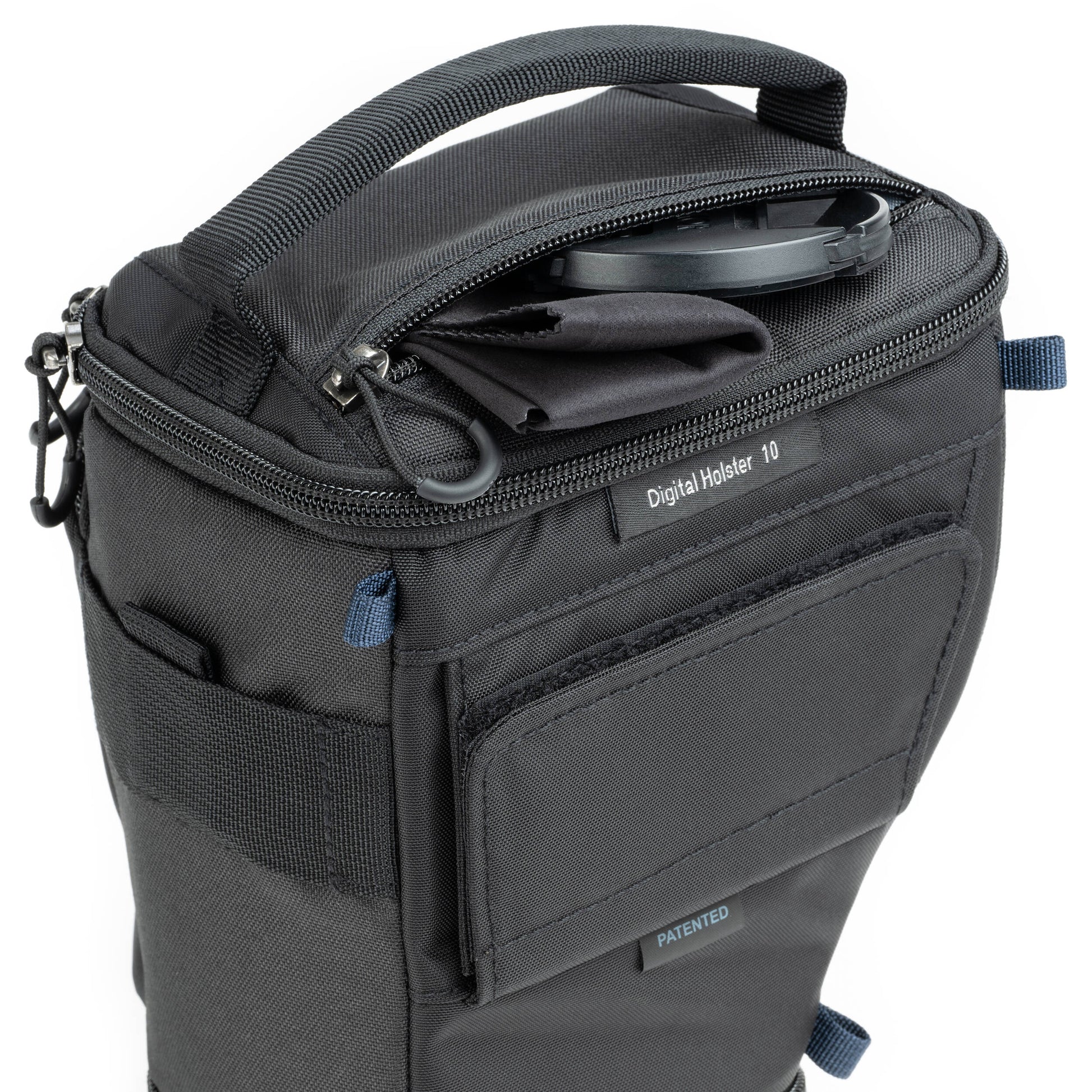 Think Tank mirrorless camera holster with accessory pockets
