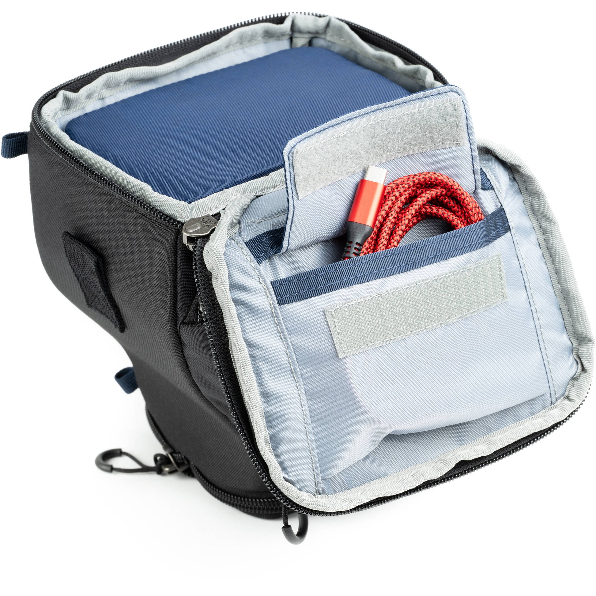 Think Tank mirrorless camera holster with accessory pockets
