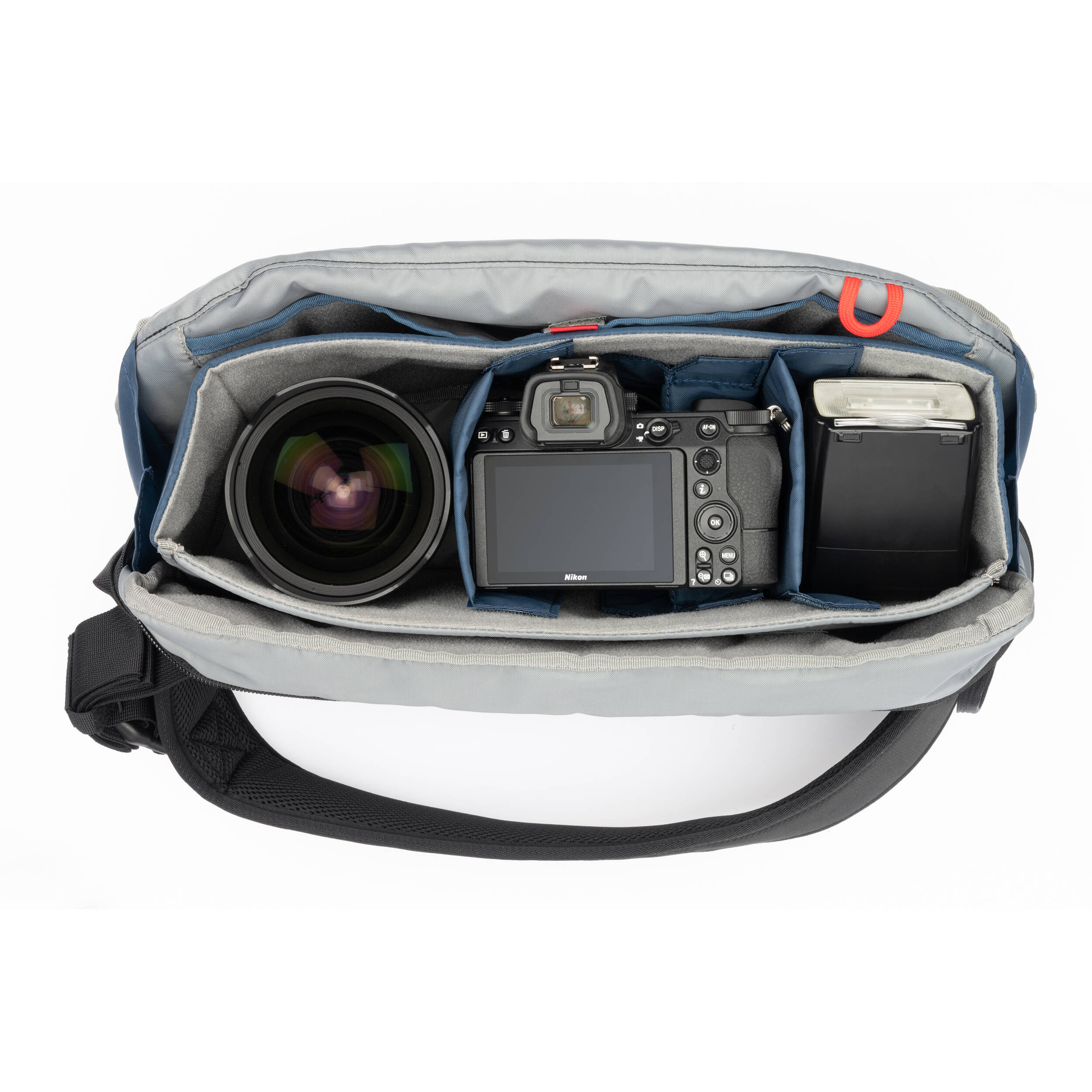 PressPass Sling Bag with removable insert, grab handle, and rain cover for easy camera access.
