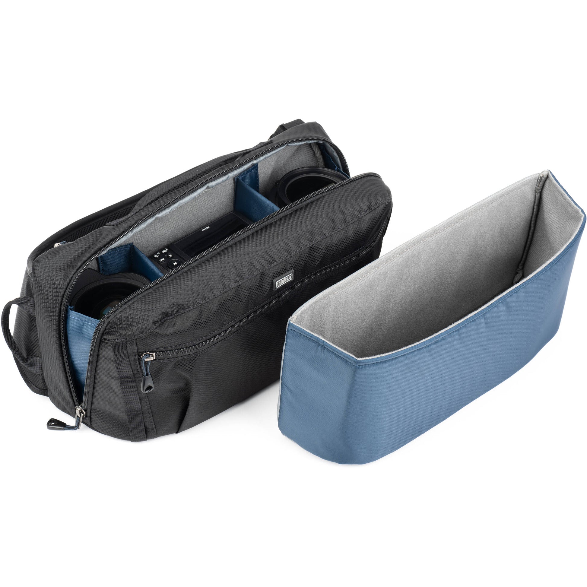PressPass Sling Bag with removable insert, grab handle, and rain cover for easy camera access.