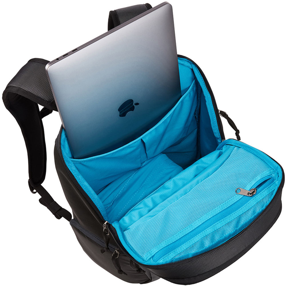 Thule camera backpack with padded compartments, adjustable dividers, and ergonomic straps