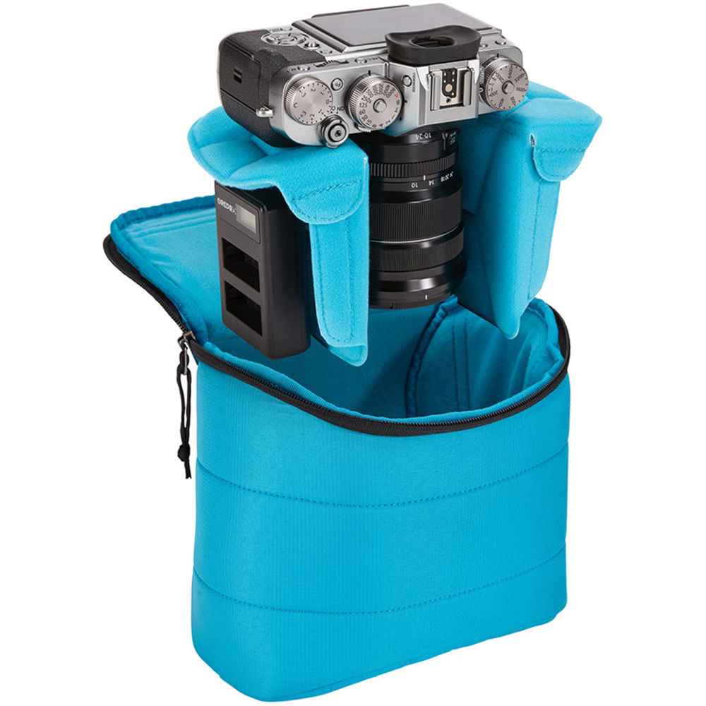 Thule camera backpack with padded compartments, adjustable dividers, and ergonomic straps