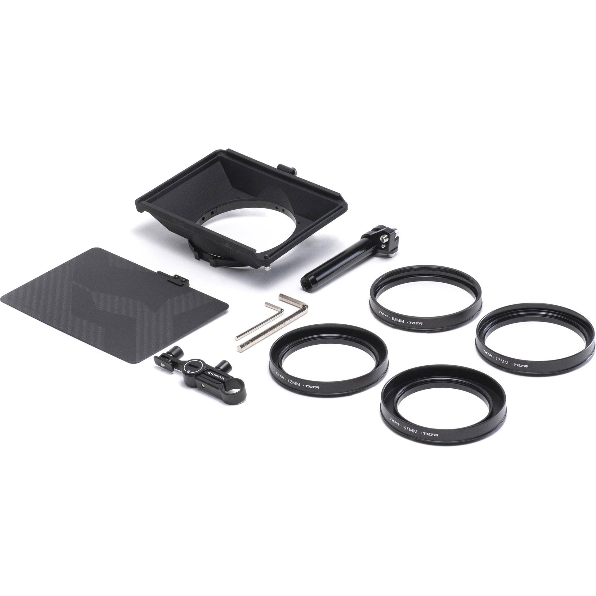 Camera sun hood filter kit with various components on a white background