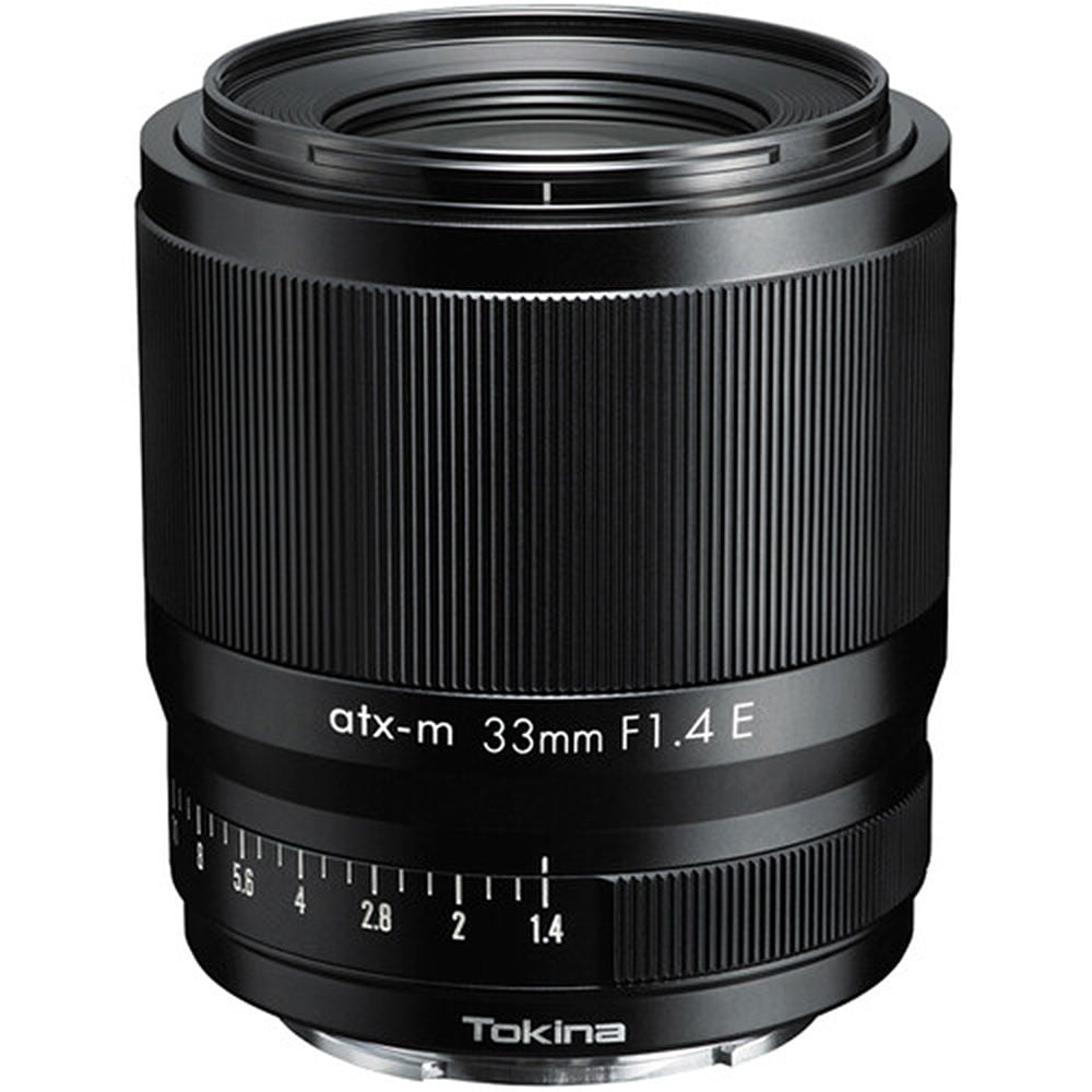 Tokina atx-m 33mm f/1.4 for Sony E. Fast standard prime with f/1.4, sharp optics, smooth bokeh, and compact design for portraits and street photography.