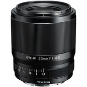 Tokina atx-m 33mm f/1.4 for Sony E. Fast standard prime with f/1.4, sharp optics, smooth bokeh, and compact design for portraits and street photography.