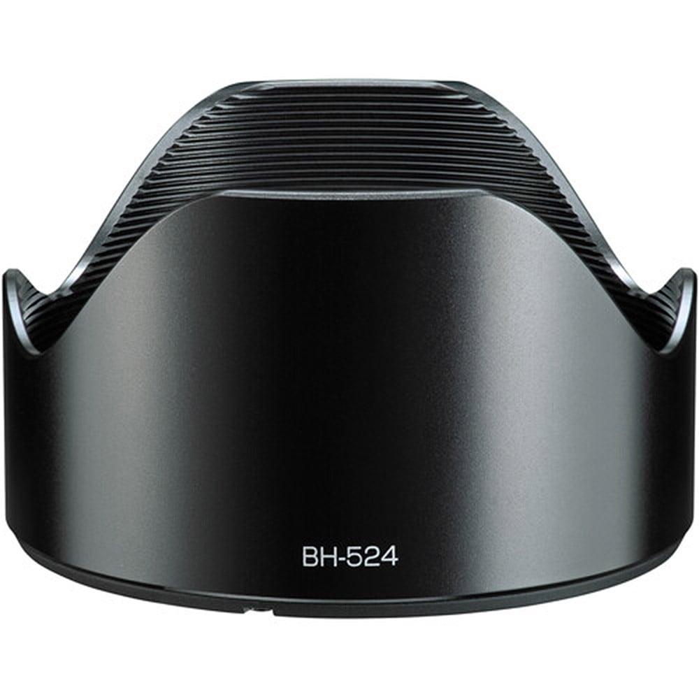 Tokina atx-m 33mm f/1.4 for Sony E. Fast standard prime with f/1.4, sharp optics, smooth bokeh, and compact design for portraits and street photography.