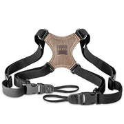Black camera harness with brown leather patch featuring 'Zeiss' logo on a white background