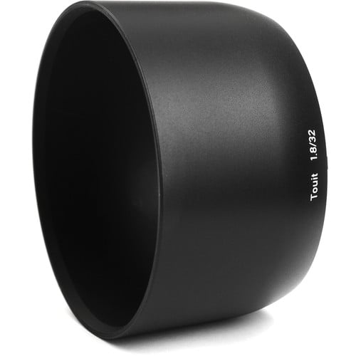 Zeiss Touit 32mm f/1.8 for Fujifilm X. APS-C standard prime with f/1.8 aperture, sharp optics, natural colours, and lightweight portability.