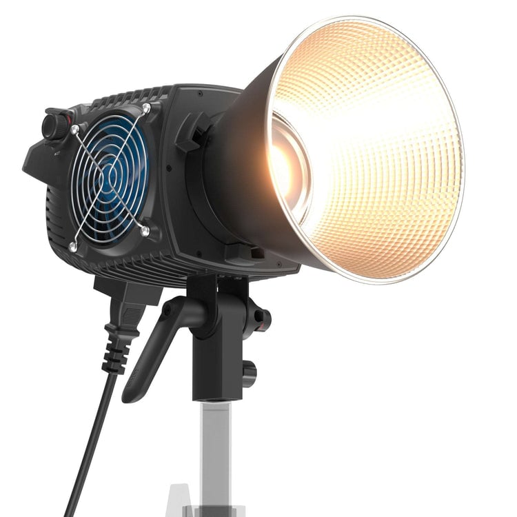 Zhiyun Molus B300 300W bi-color LED monolight — compact black fixture with Bowens mount, integrated AC power source, and cooling vents.