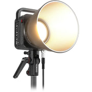 The Zhiyun Molus G300 COB Light is a powerful continuous lighting fixture for film and video production, featuring a separate light/controller design with a wide color temperature range and an advanced cooling system.