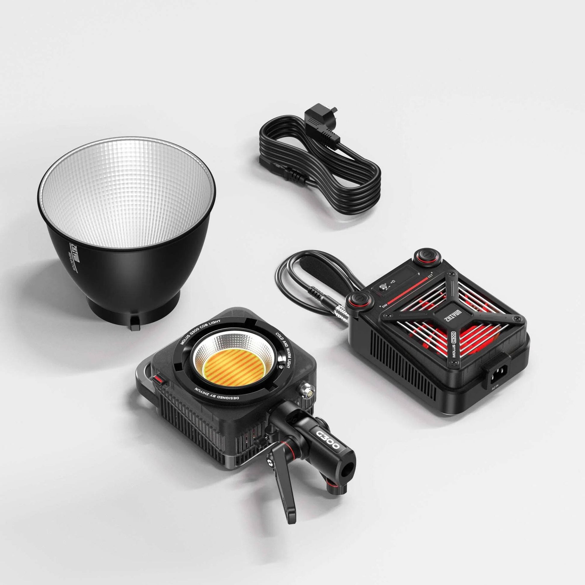 The Zhiyun Molus G300 COB Light is a powerful continuous lighting fixture for film and video production, featuring a separate light/controller design with a wide color temperature range and an advanced cooling system.
