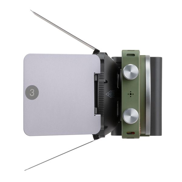 Zhiyun X100 RGB compact handheld video light with mini lens reflector and magnetic barn doors for even, vibrant lighting.