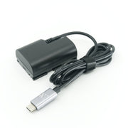 ZILR Dummy Battery LP‑E6 with built-in USB‑C cable for Canon cameras, shown as a rectangular power adapter replica that fits into the camera’s battery compartment and provides continuous power via USB‑C connection.